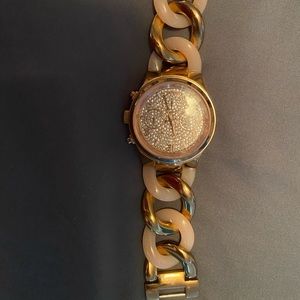 Michael Kors watch rose gold and pink.